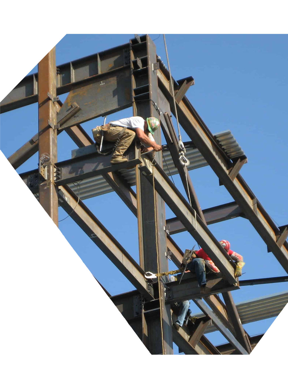 Workers working on steel building